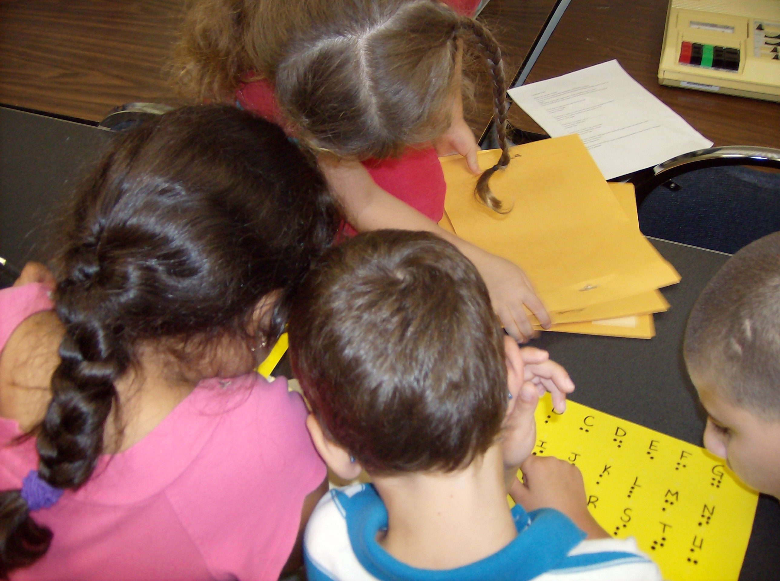 Children learning braille.